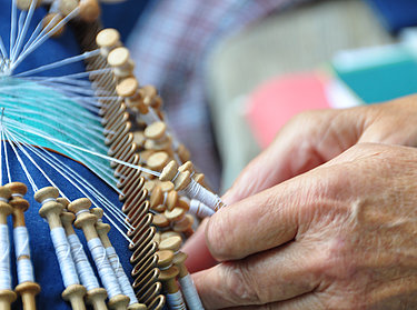 Salzburg Open Air Museum - Handicraft demonstration of "lace making" Salzburg Open Air Museum - Handicraft demonstration of "lace making"