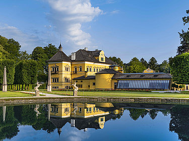 Hellbrunn Palace & Trick Fountains - Water parterre and the palace Hellbrunn Palace & Trick Fountains - View over the water parterre and onto the palace